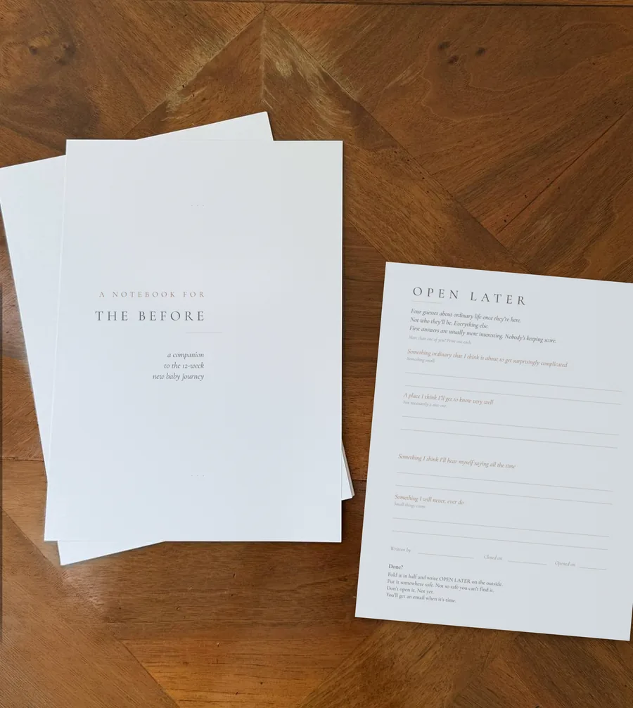 The Before Notebook and the Open Later page laid out on a wooden table.